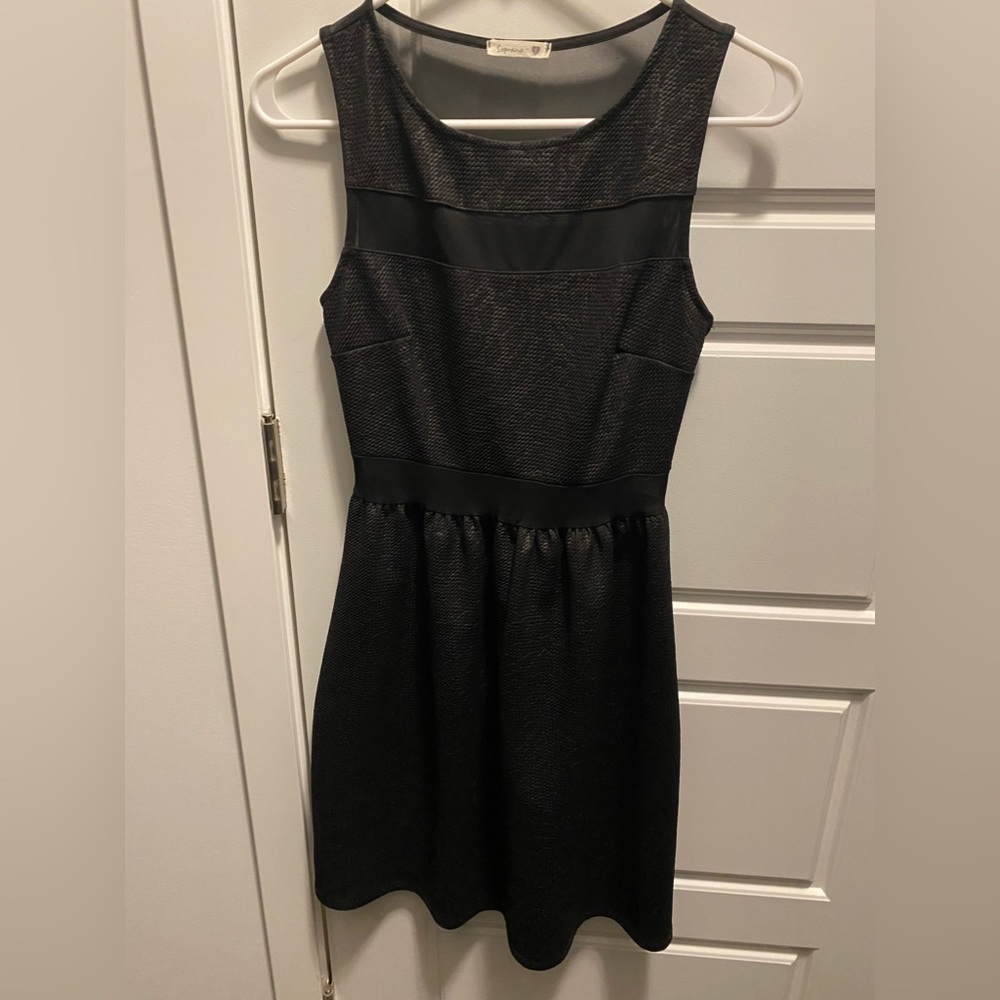 Very flattering dress. Some areas are sheer. Purchased at Nordstrom for $89